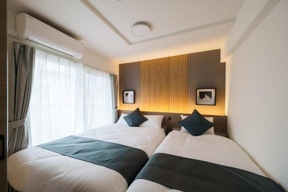 New OPEN Family 4-minute walk from the station Maximum 5 people Fully air-conditioned Parking included Apartment in Sapporo