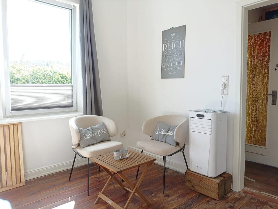 Photo of the whole room, Seating area, air conditioner
