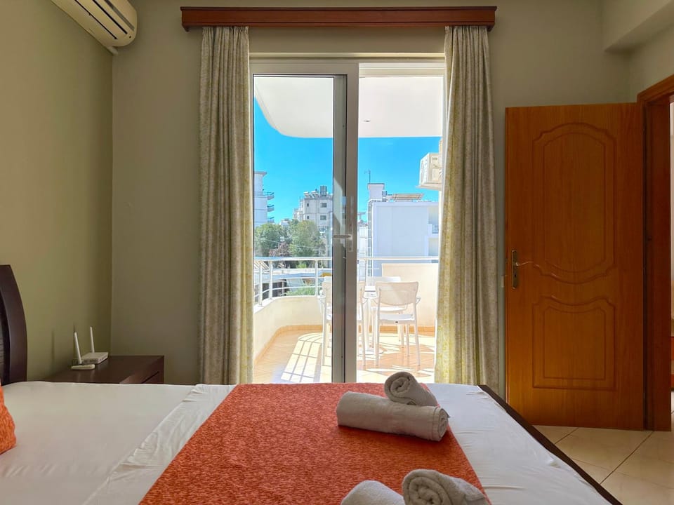 Bed, Balcony/Terrace, Bedroom, hair dryier, towels, wardrobe, air conditioner