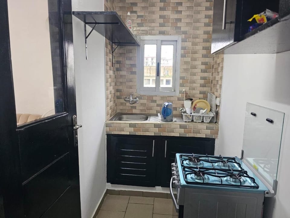 Kitchen or kitchenette, oven, stove
