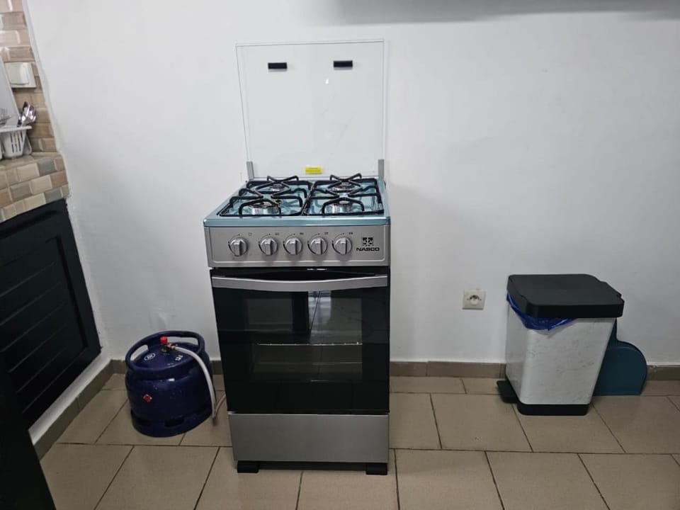 Kitchen or kitchenette, oven, stove