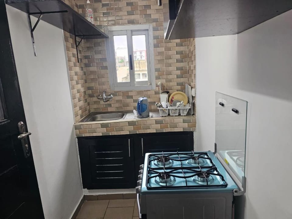 Kitchen or kitchenette, stove