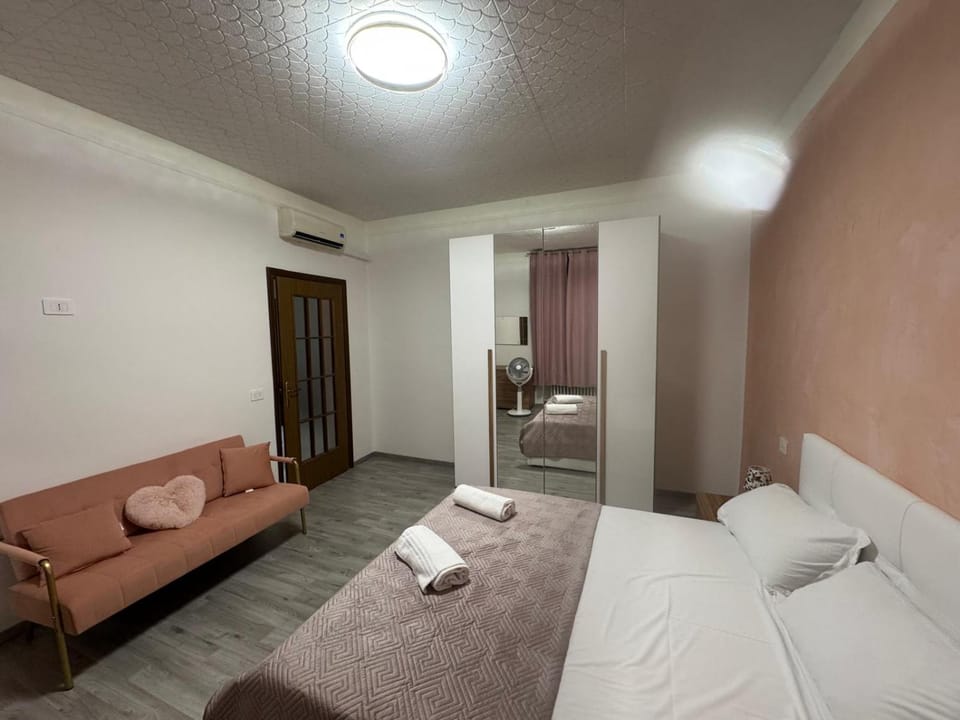 Bed, Photo of the whole room, Seating area, Bedroom, towels, wardrobe, air conditioner