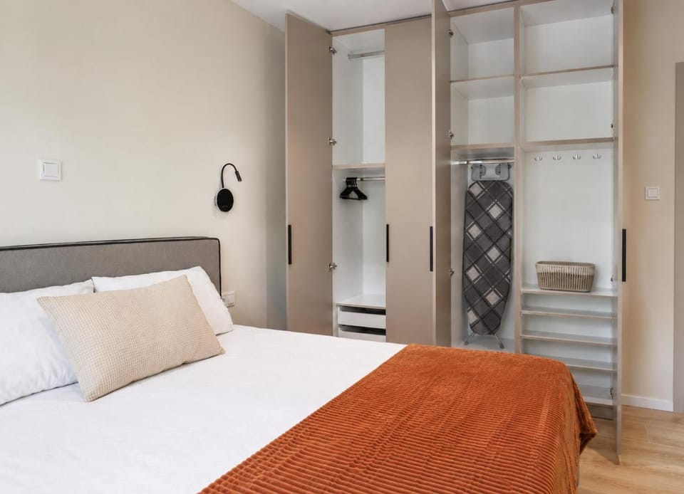 Bed, Bedroom, flat iron, hair dryier, wardrobe
