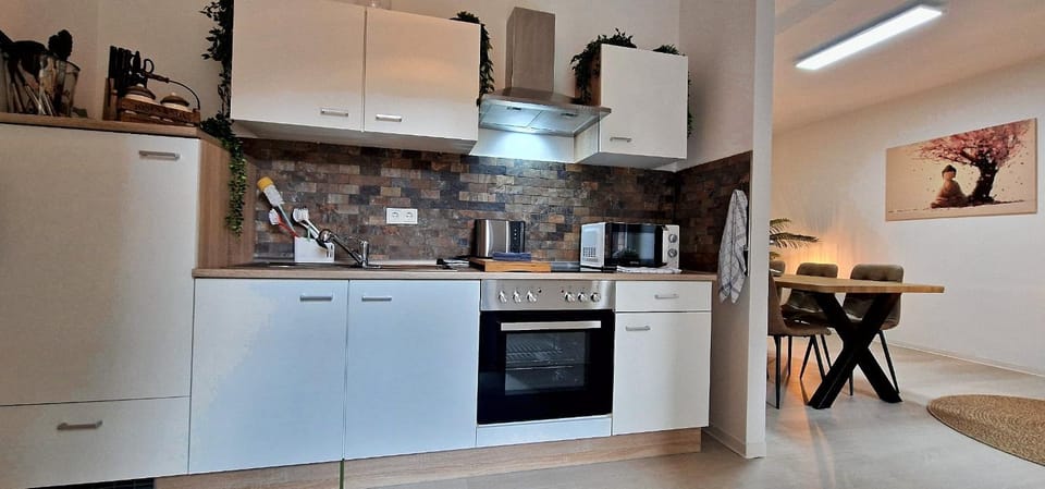 Kitchen or kitchenette, stove, kitchen