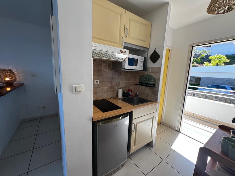 Kitchen or kitchenette, stove