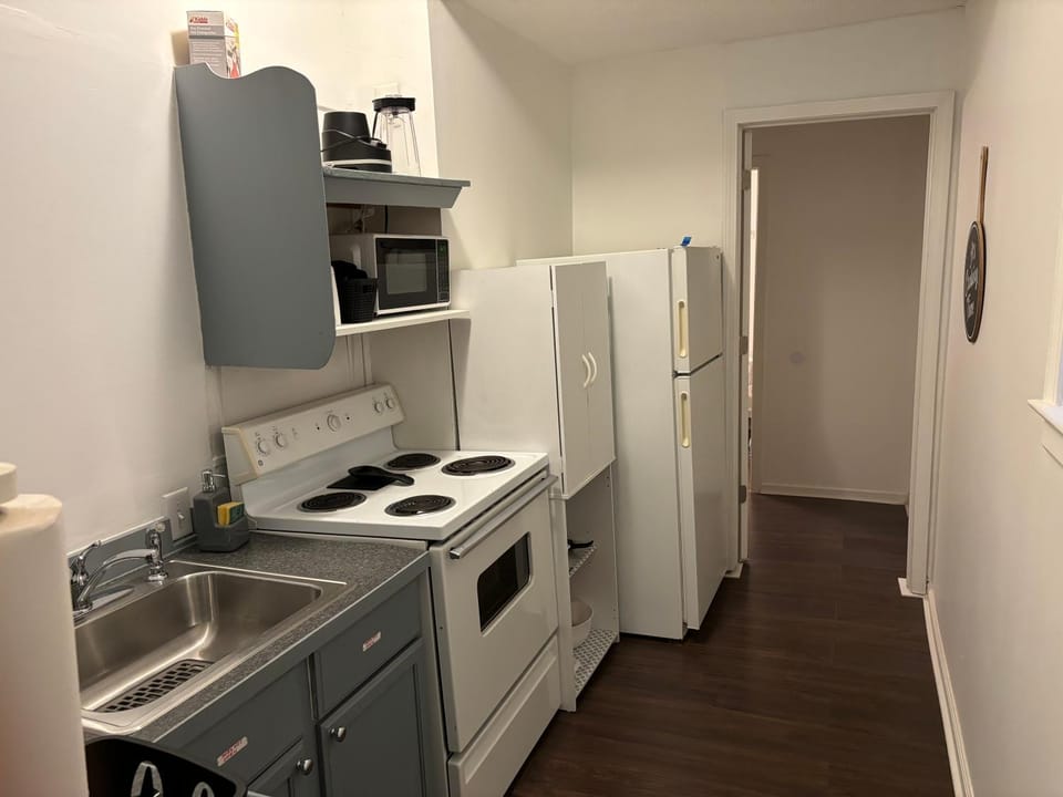 Kitchen or kitchenette, microwave, oven