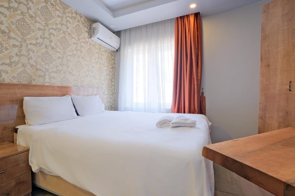 Bed, Photo of the whole room, Bedroom, towels, air conditioner
