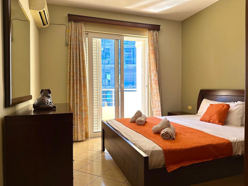 Bed, Balcony/Terrace, Bedroom, hair dryier, towels, air conditioner