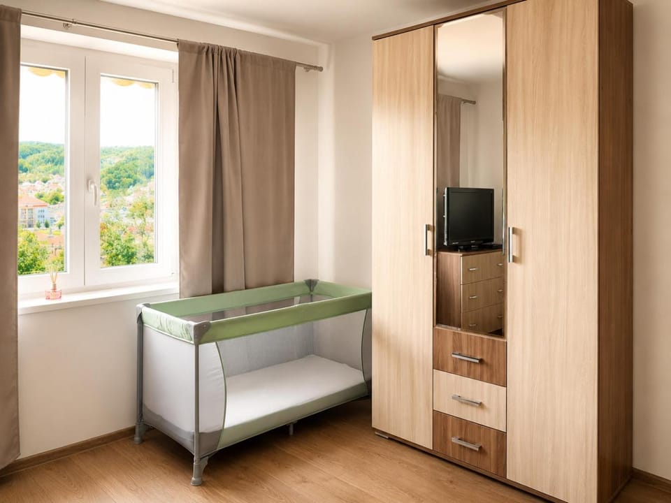 Bedroom, cot, wardrobe