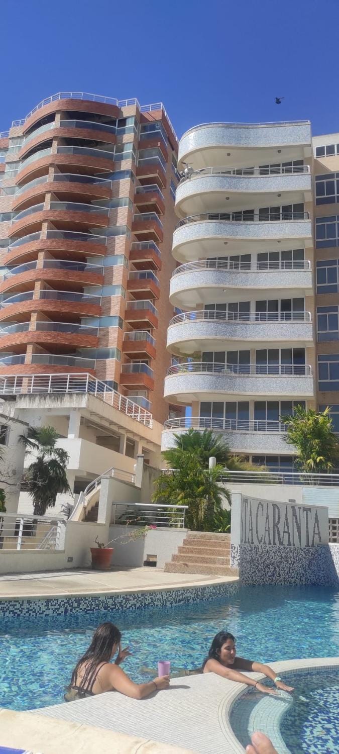 Property building, People, Pool view, group of guests, sunbed