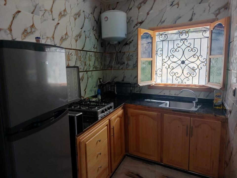 Kitchen or kitchenette, stove