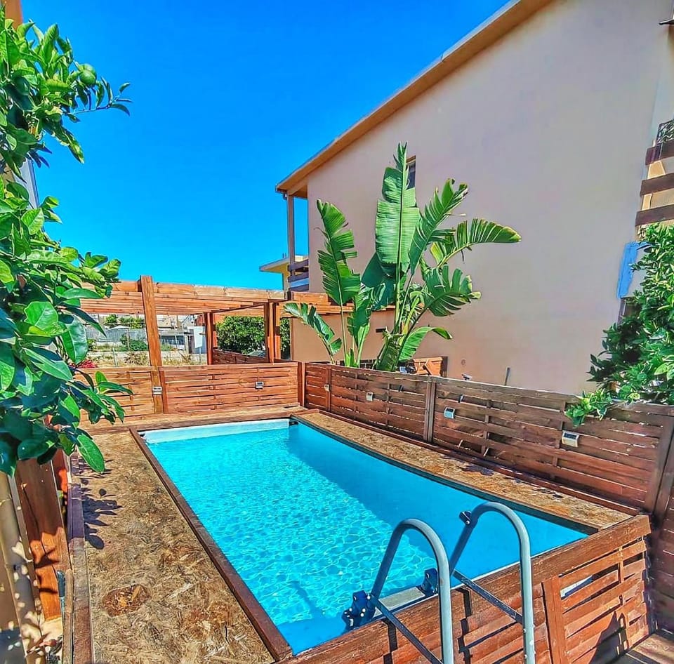 Patio, Day, Pool view, Swimming pool, sunbed