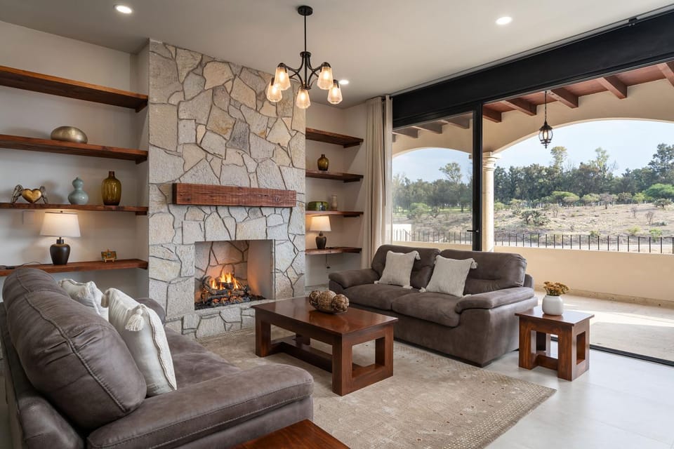 Patio, View (from property/room), Living room, Seating area, fireplace