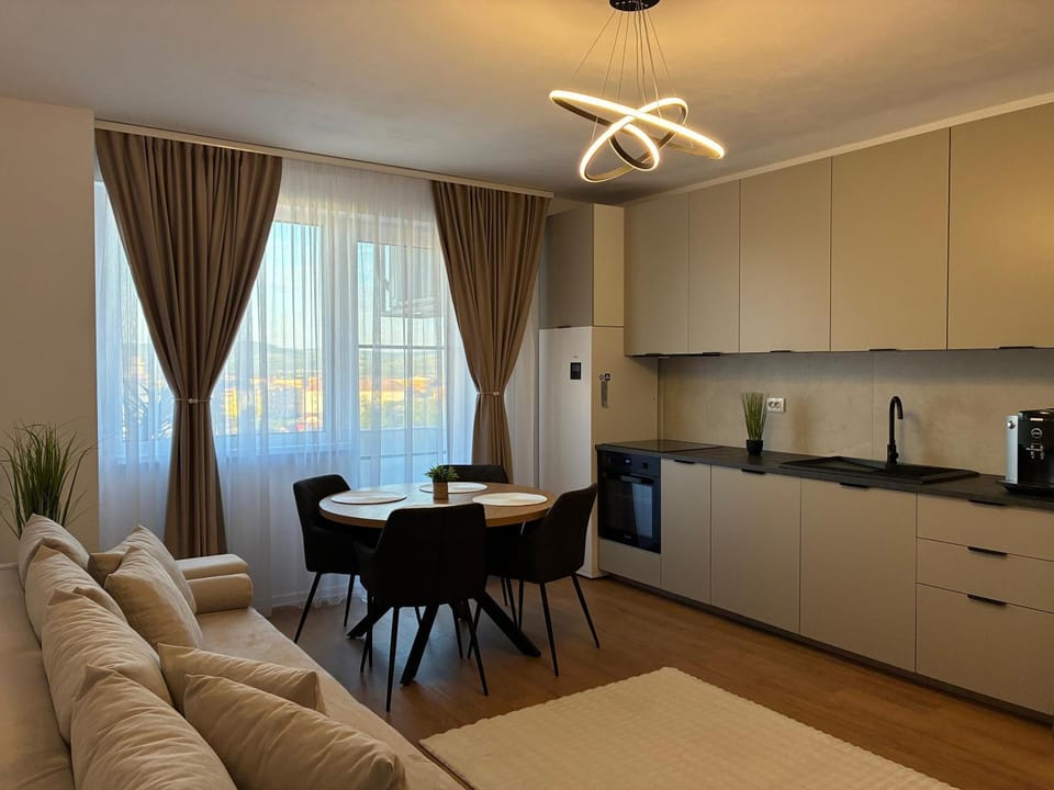 Coffee/tea facilities, Living room, Seating area, Dining area, dishwasher, oven, stove