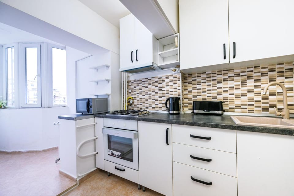 Kitchen or kitchenette, stove, toaster