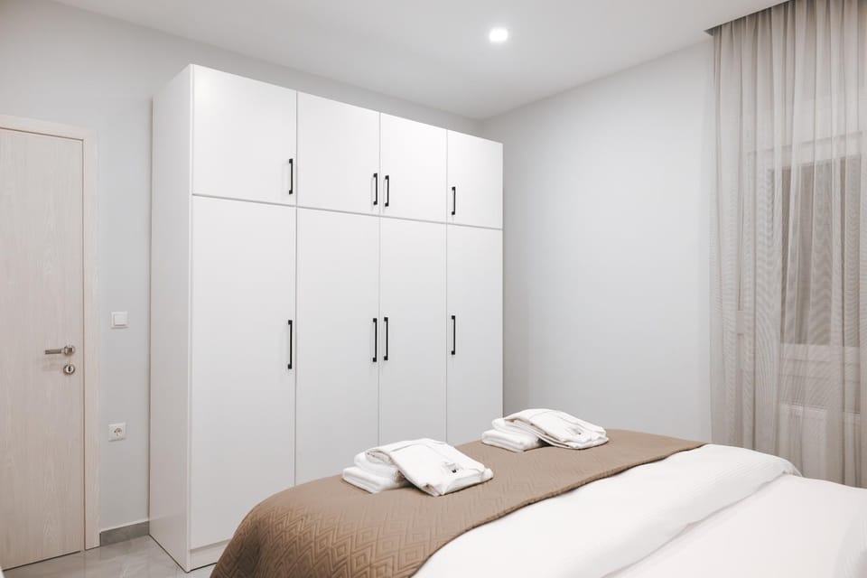 Bedroom, flat iron, towels, wardrobe