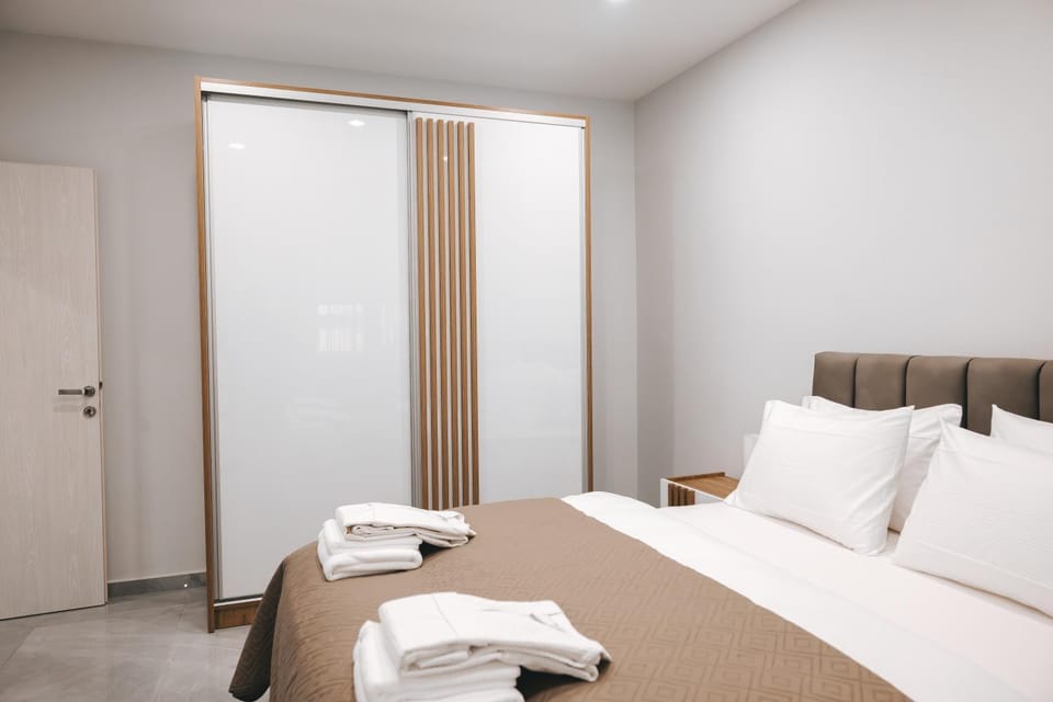 Bedroom, flat iron, towels, wardrobe