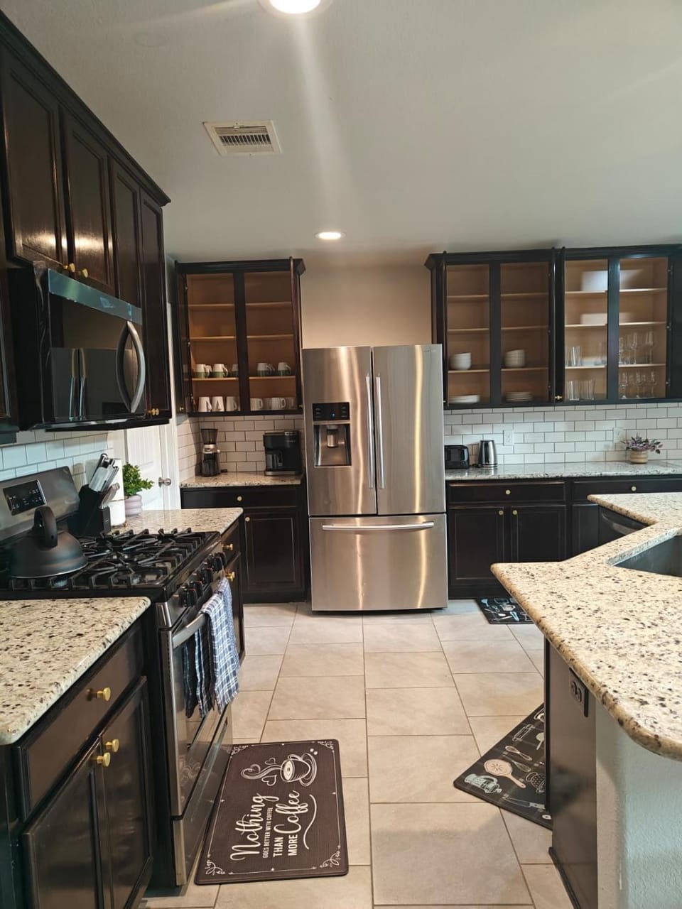 Kitchen or kitchenette, dishwasher, oven, stove, toaster