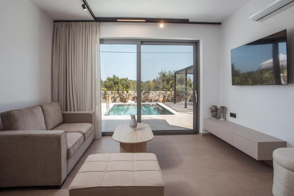 TV and multimedia, Living room, Seating area, Pool view, Swimming pool