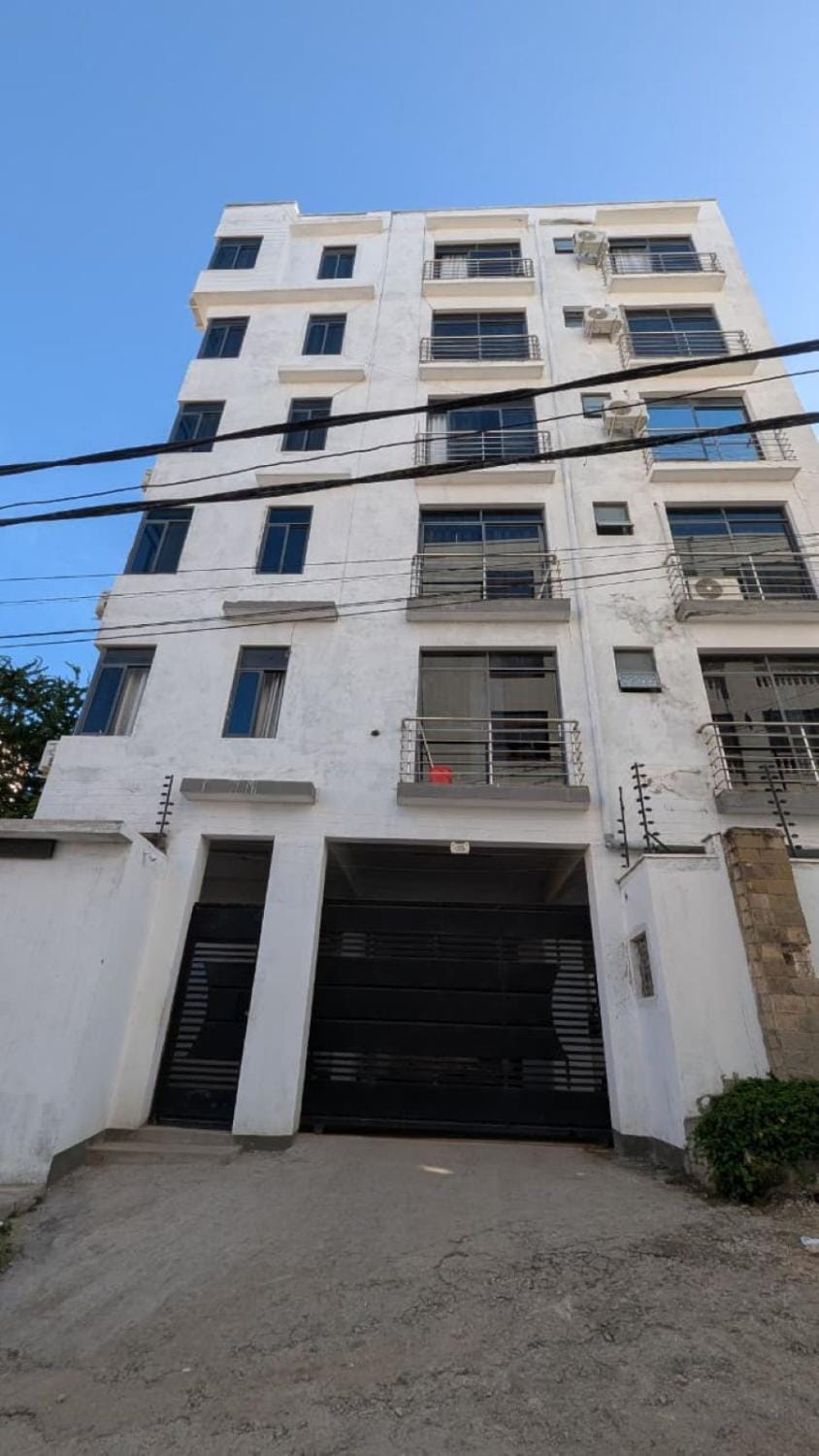 Property building, Day, Quiet street view