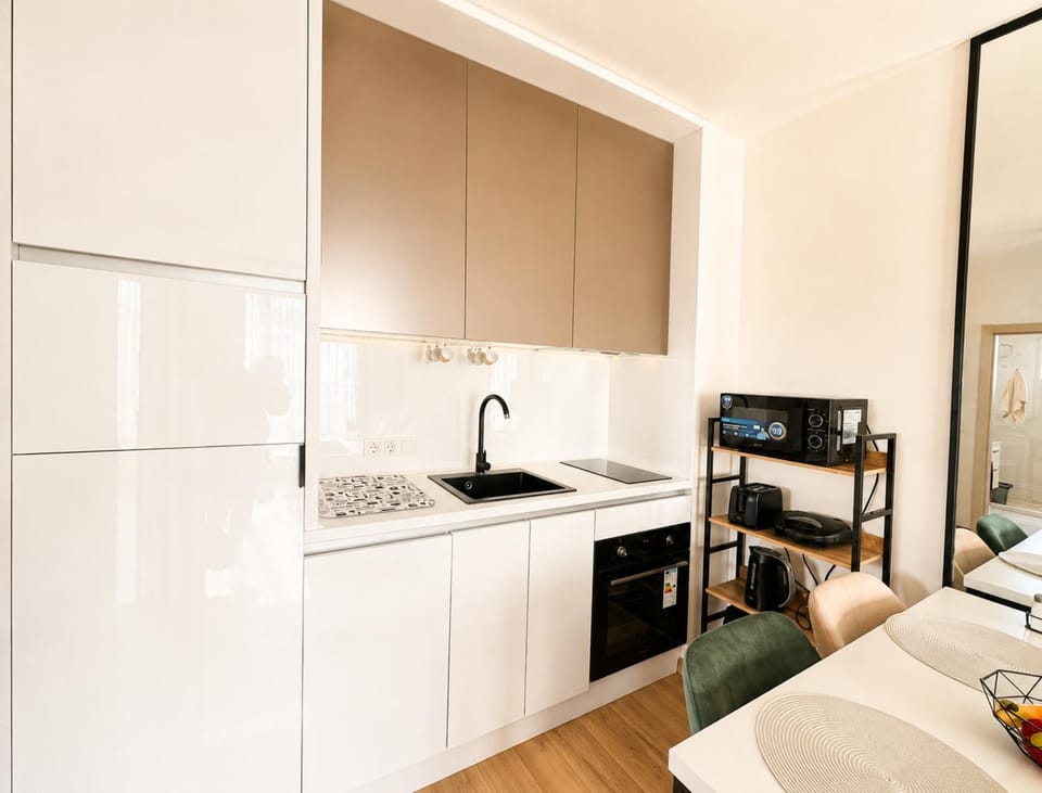 Kitchen or kitchenette, microwave, oven, stove, toaster