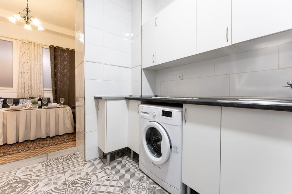 Kitchen or kitchenette, stove, washing machine