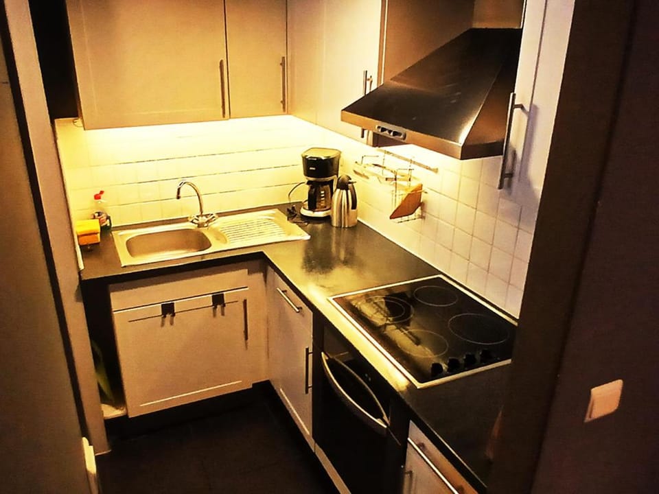 Kitchen or kitchenette, stove