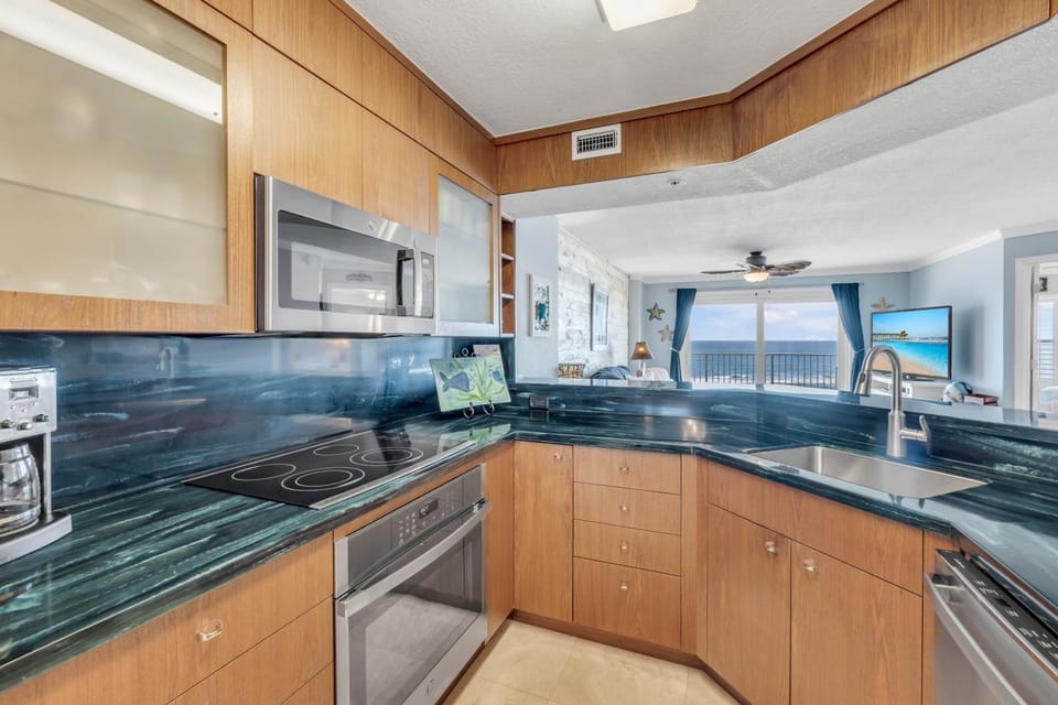 NEW Listing! Direct Oceanfront 2-2 Private Balcony Heated Pool & Garage Parking Apartment in Ormond By The Sea