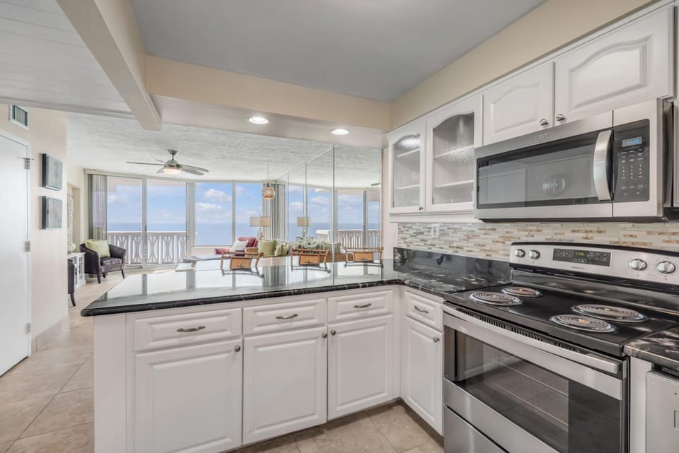 New Listing! Oceanfront 2-2 Huge Balcony, Beachfront Pool & Garage Parking Apartment in Ormond By The Sea
