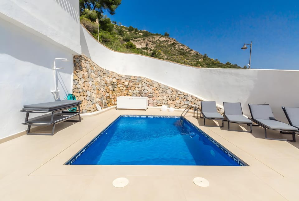 Property building, Living room, Swimming pool