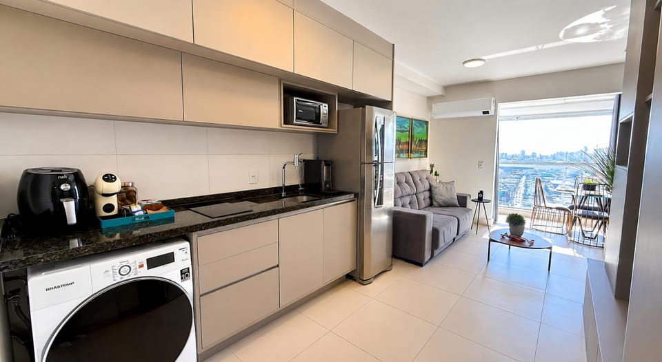 View (from property/room), Kitchen or kitchenette, stove, washing machine, dryer