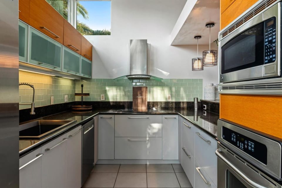 Miami Rooftop Home Under a Banyan Tree | Central 4BR Retreat Sleeps 8-10 House in Coral Gables