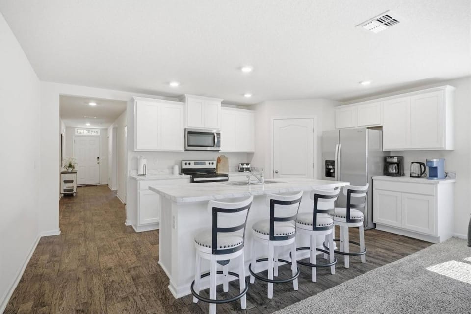 Swaying Palm | Palm Coast House in Palm Coast