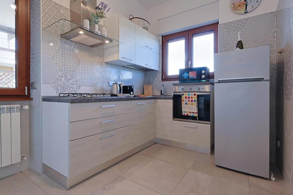 Kitchen or kitchenette, oven, stove