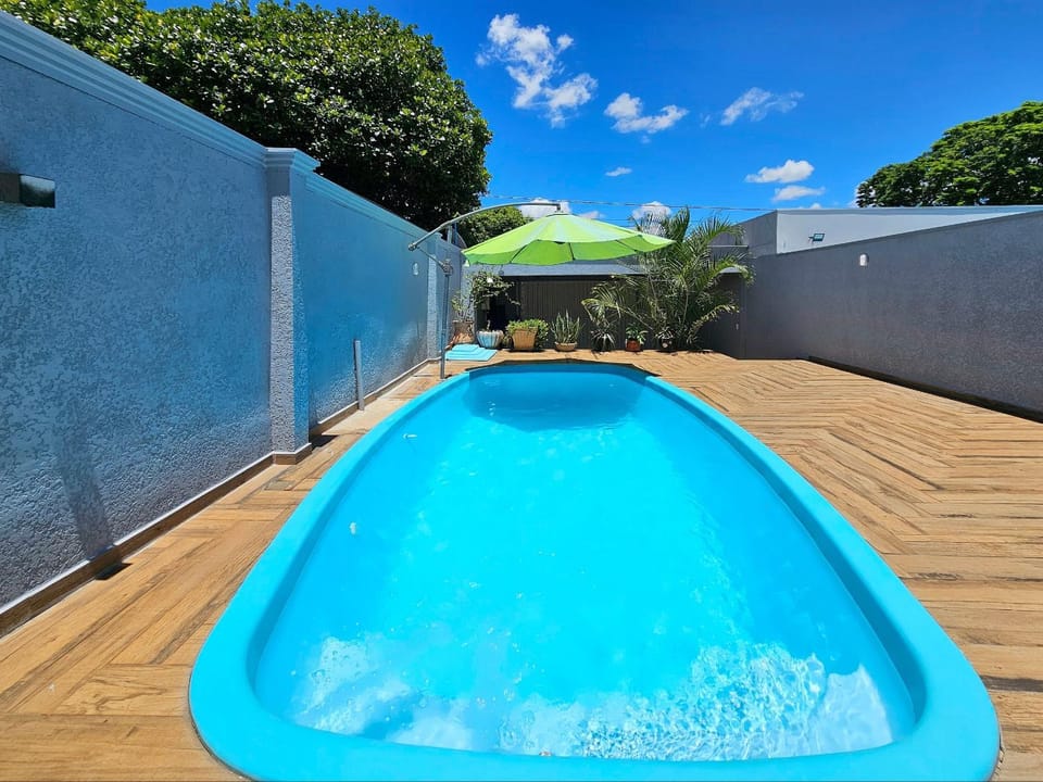 Casa 2 suítes churrasq e piscina 7 min do centro House in Foz do Iguaçu