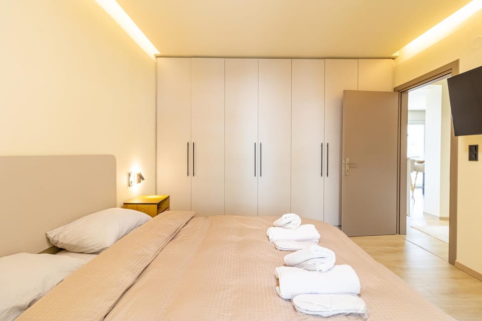 Bed, Photo of the whole room, Bedroom, towels, wardrobe