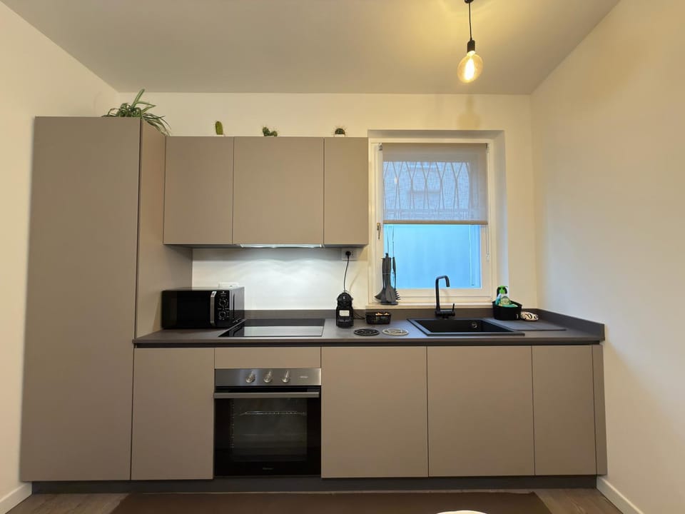 Kitchen or kitchenette, stove