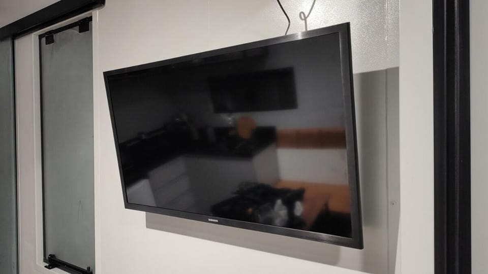 Studio 1 com Ar condicionado Quente e Frio Completo perto de tudo WIFI e lavanderia Apartment in Curitiba
