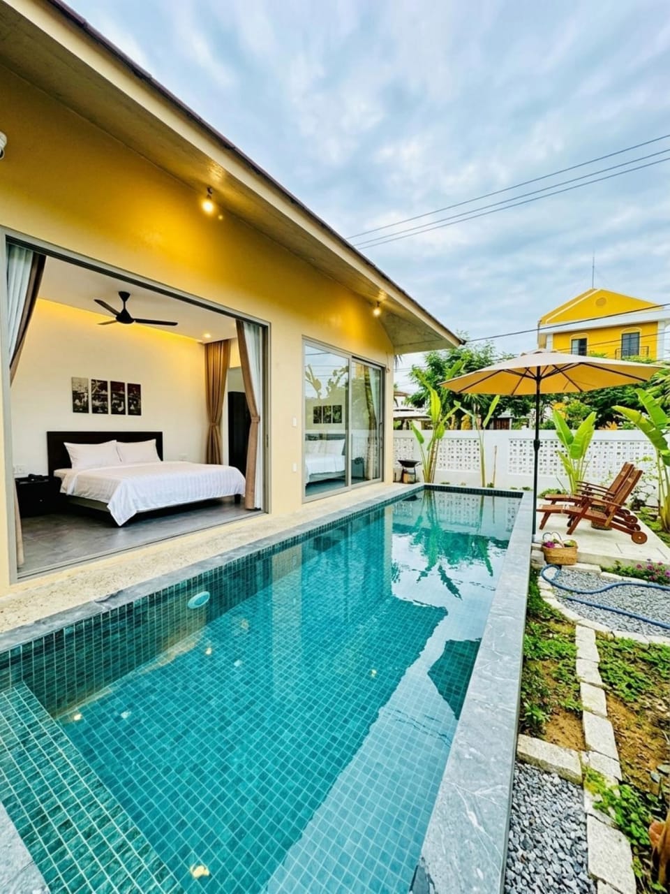 Patio, Day, Natural landscape, Pool view, sunbed