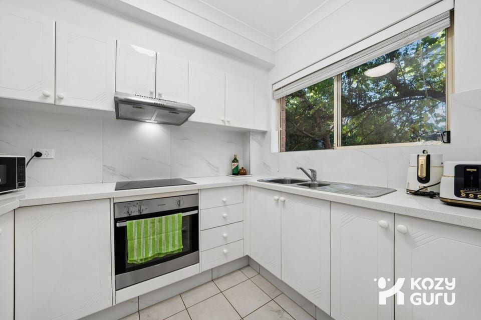 KozyGuru | Bexley | Urban Escape with Leafy Charm Apartment in Sydney