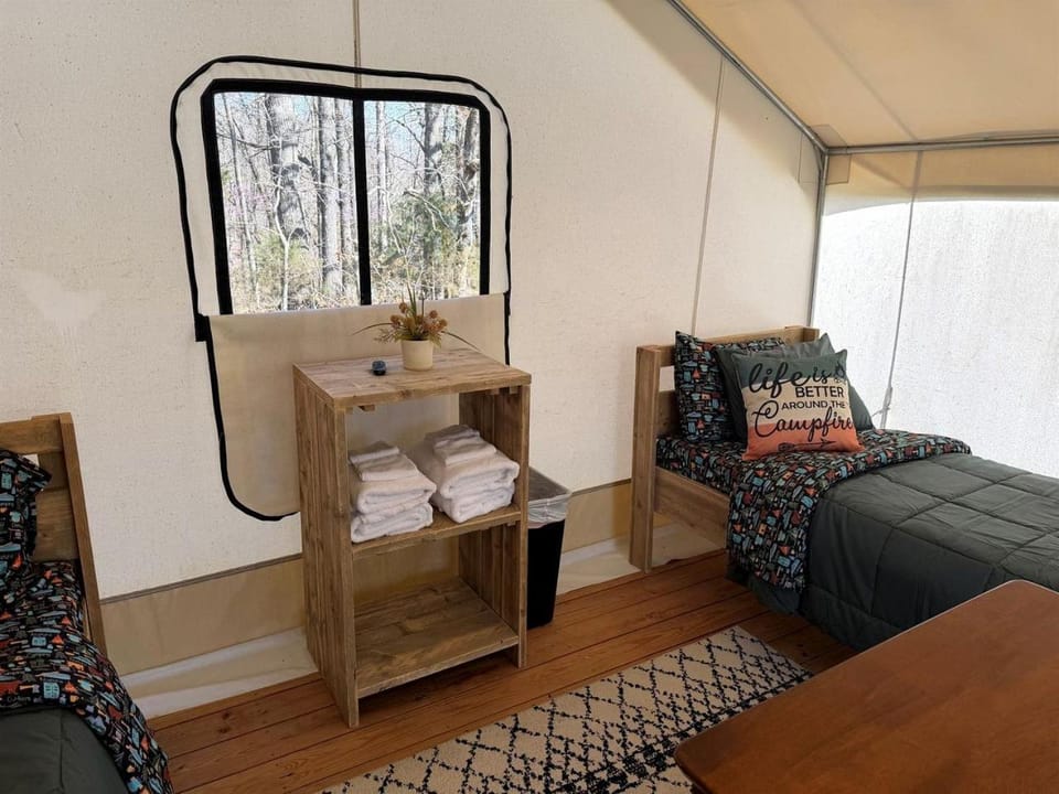 Gorgeous Secluded Tented Cabin Fire Pit Provided in Cassville, Missouri Cabin in Roaring River Township