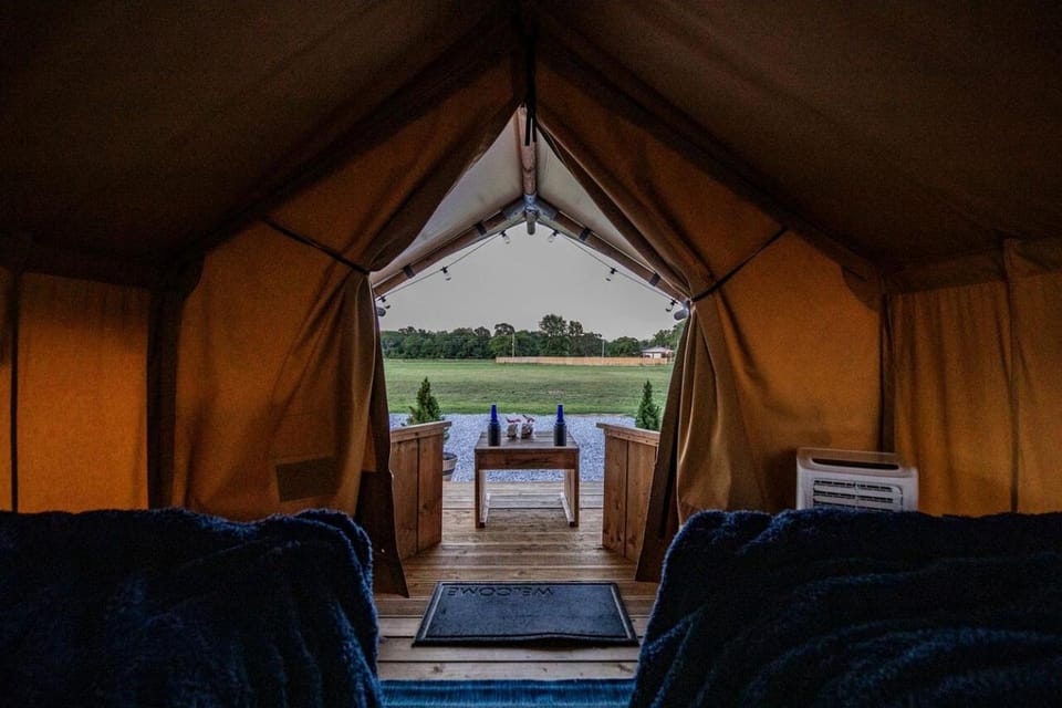 Comfortable Glamping Tent with Fire Pit and Stream Access Near Mark Twain National Forest in Missouri Luxury tent in Roaring River Township