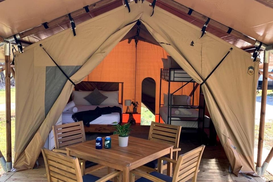 Cozy Lakeside Safari Tent on a Fantastic Resort for an Unforgettable Family Glamping Adventure in Onalaska, Texas Luxury tent in Lake Livingston