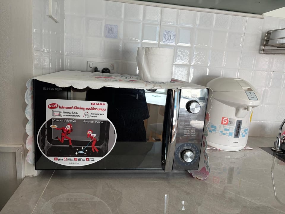 Kitchen or kitchenette, microwave