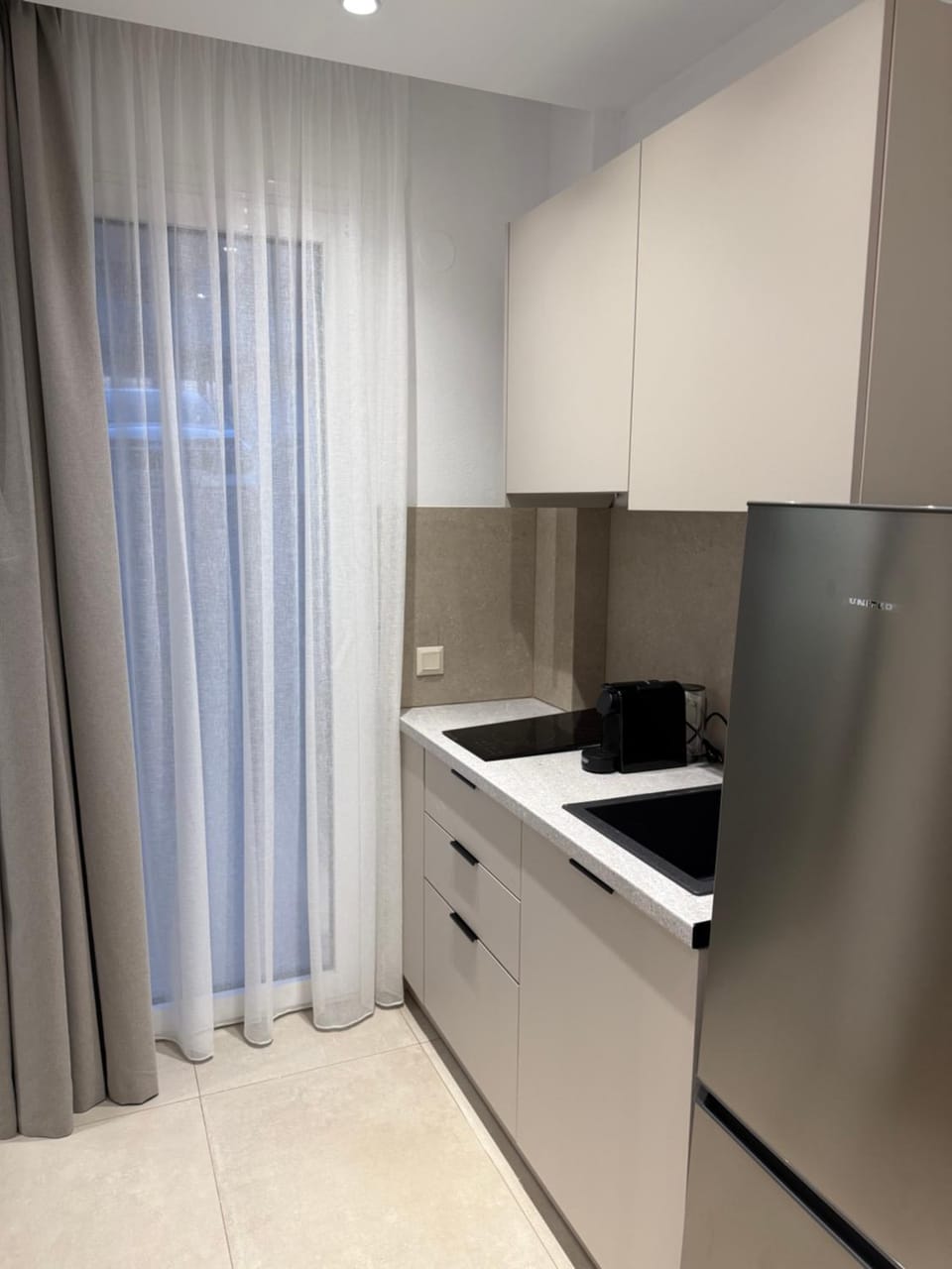 Kitchen or kitchenette, stove