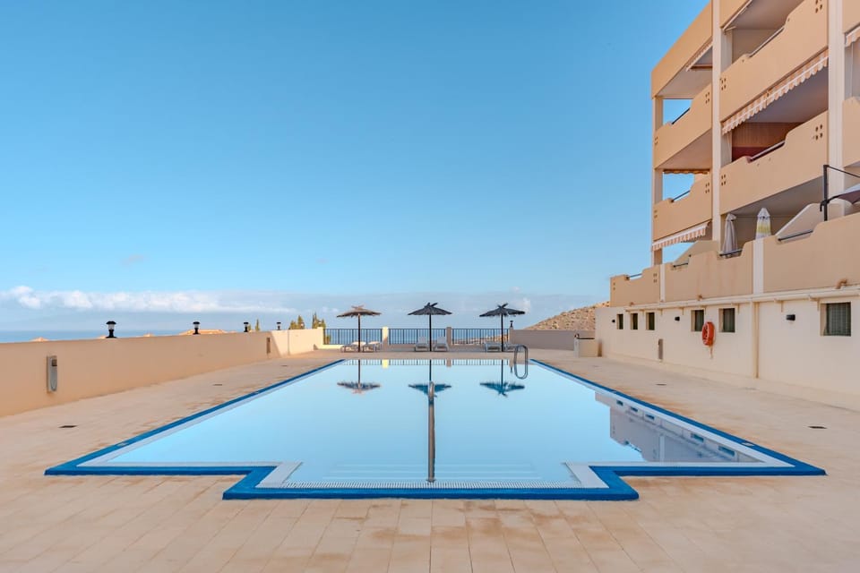 Property building, Living room, Swimming pool
