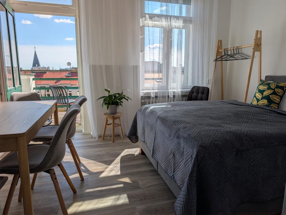 Bed, Seating area, Bedroom, City view