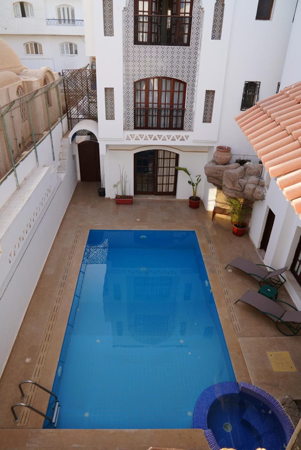 Property building, Swimming pool, Swimming pool, sunbed