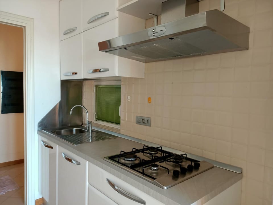 Kitchen or kitchenette, stove